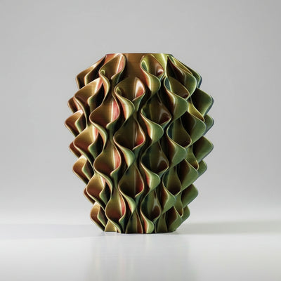 Coral vaas in geel, blauw en rood kleurverloop – 3D-geprint designobject met golvend coralpatroon en levendige kleurovergang van Studio VormVezel